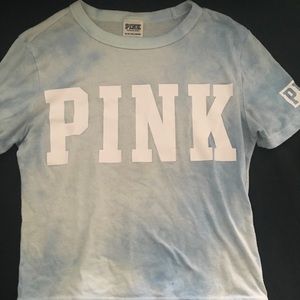 This is a cropped short sleeve shirt